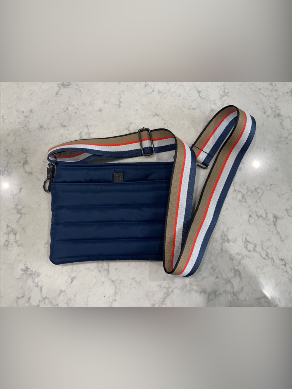 THINK ROYLN Navy Crossbody with Orange-White-Blue Striped Strap